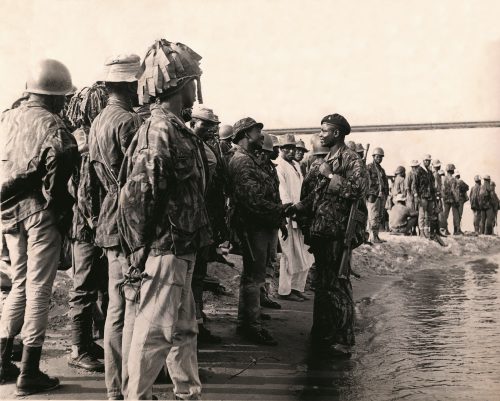 Major Shehu Musa Yar’Adua briefing frontline troops of the Second Division at Asaba before launching the strategic assault to capture Onitsha