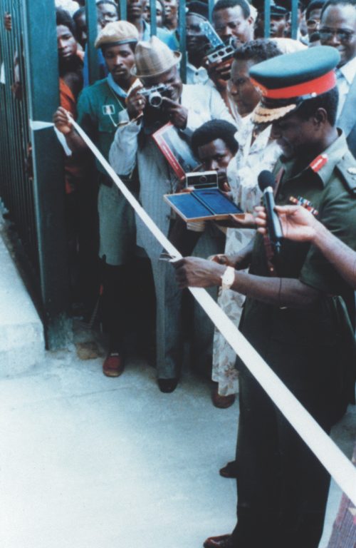 Shehu Musa Yar’Adua (right) cutting a ribbon during an official commissioning ceremony during his tenure as Chief of Staff, Supreme Headquarters
